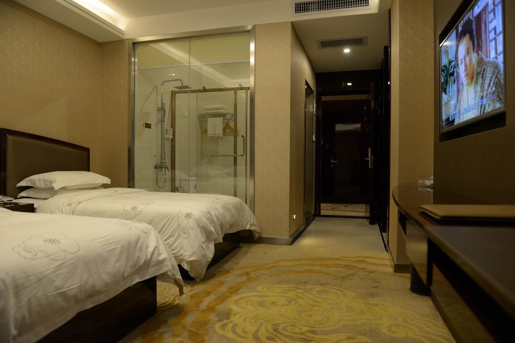 Tie Cheng Hotel Γκουανγκζού Δωμάτιο φωτογραφία