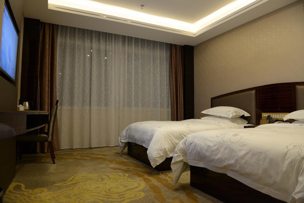 Tie Cheng Hotel Γκουανγκζού Δωμάτιο φωτογραφία